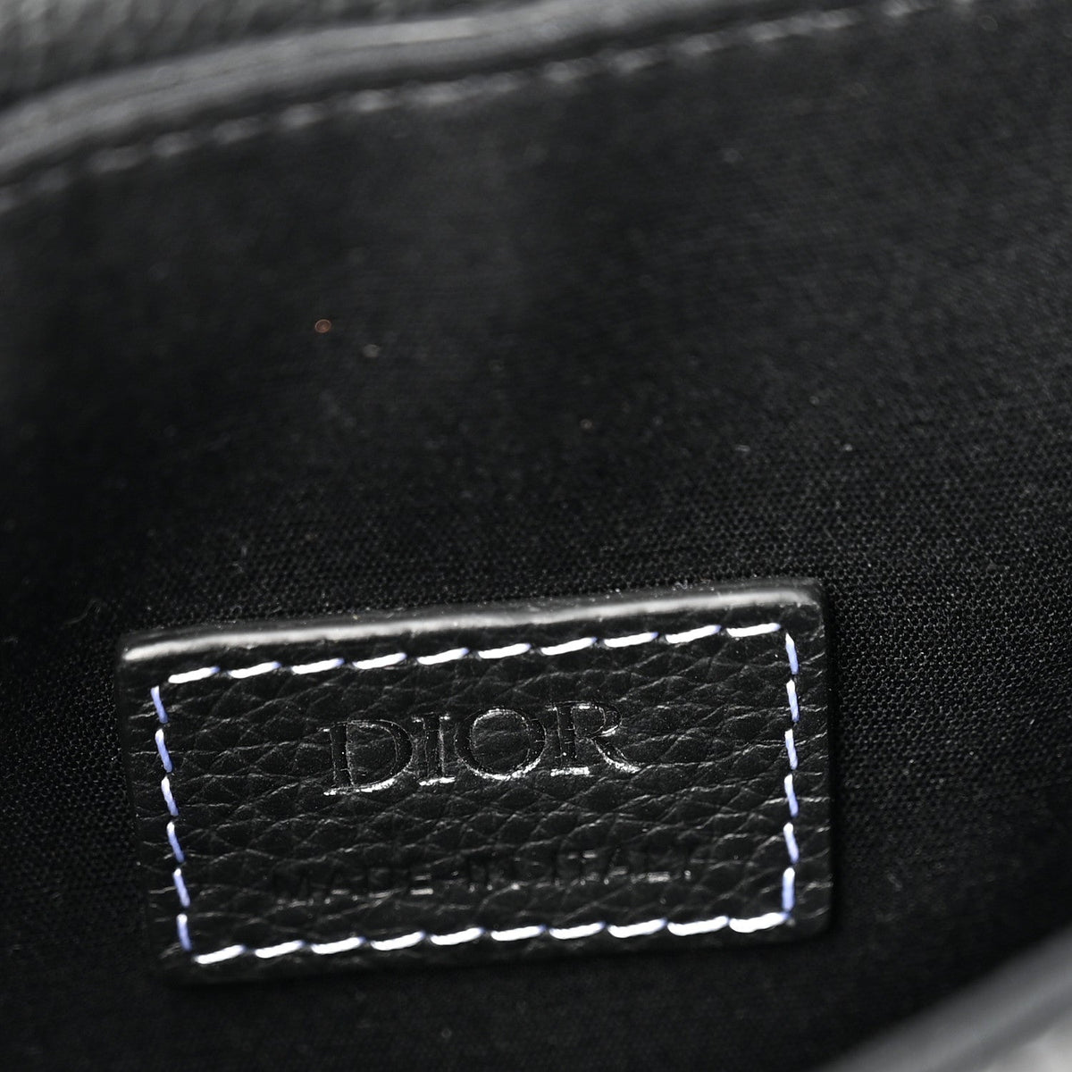 X KAWS Grained Calfskin Saddle Pouch Black