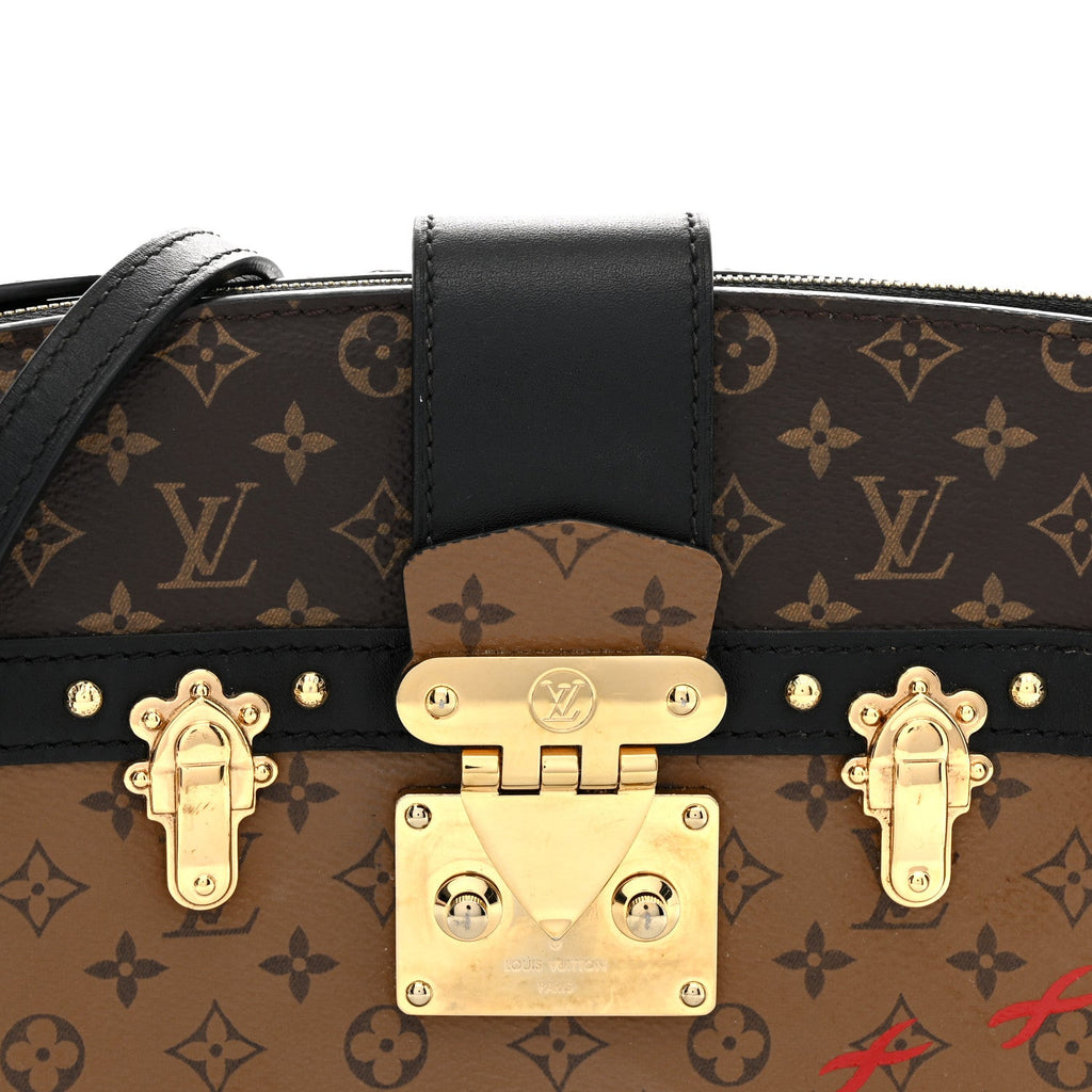 Reverse Monogram Trunk Clutch