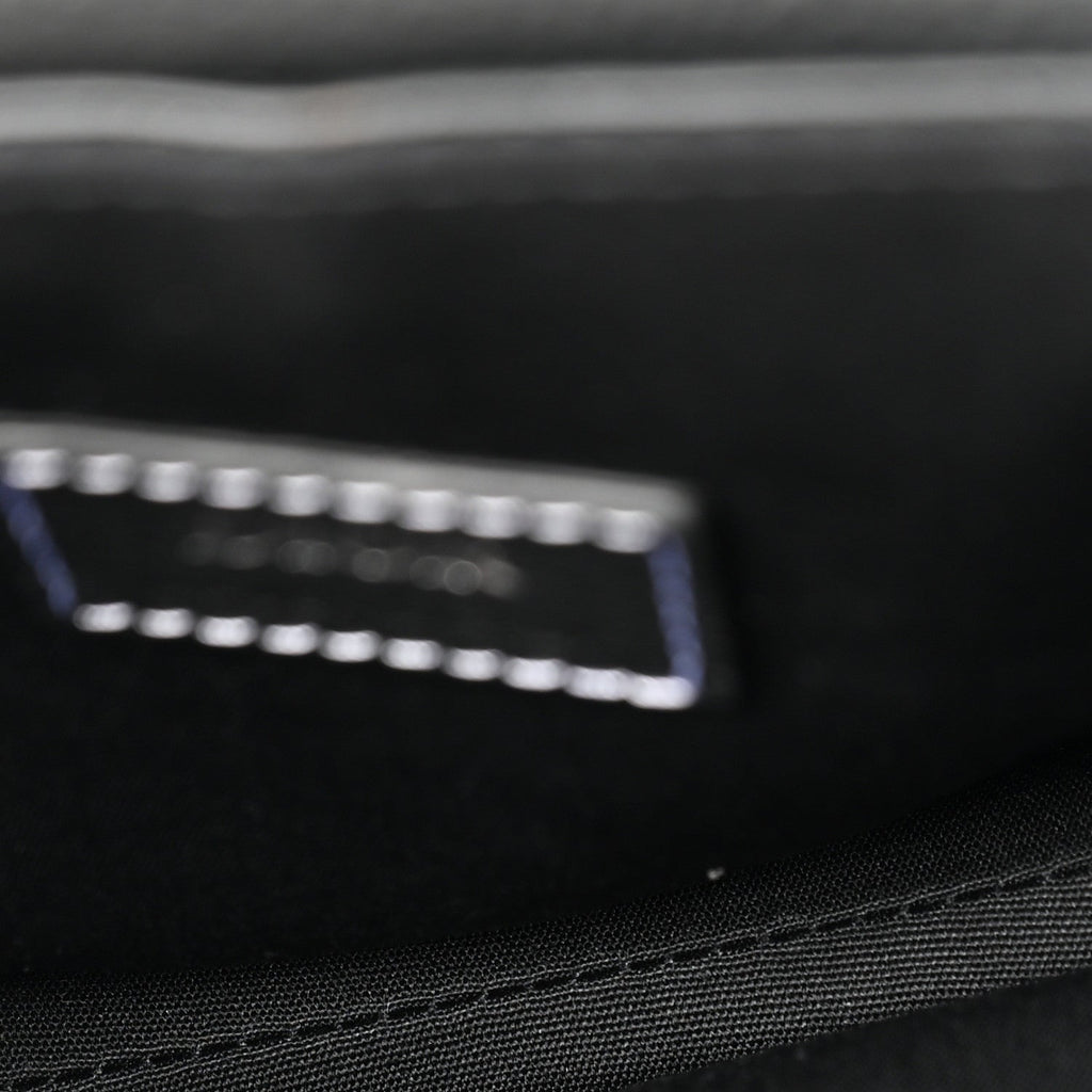 X KAWS Grained Calfskin Saddle Pouch Black