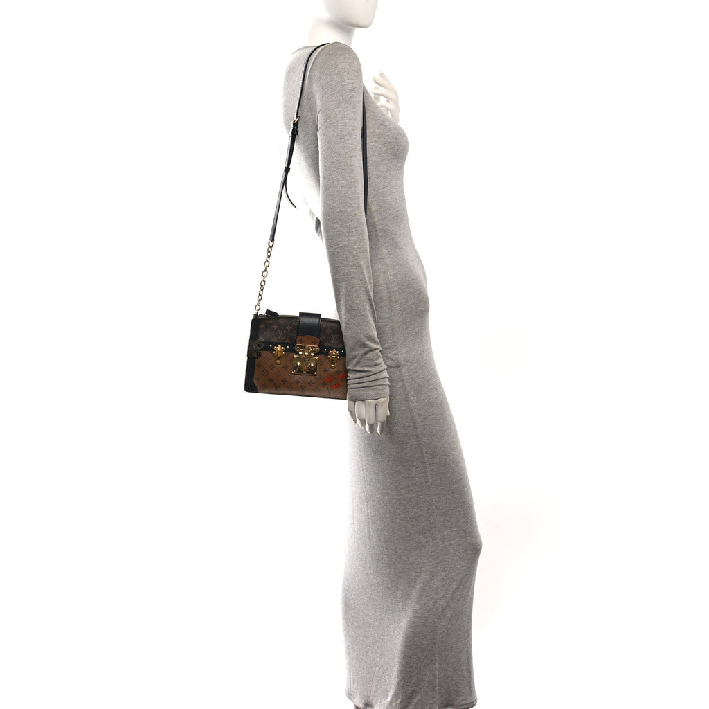 Reverse Monogram Trunk Clutch