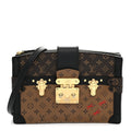 Reverse Monogram Trunk Clutch