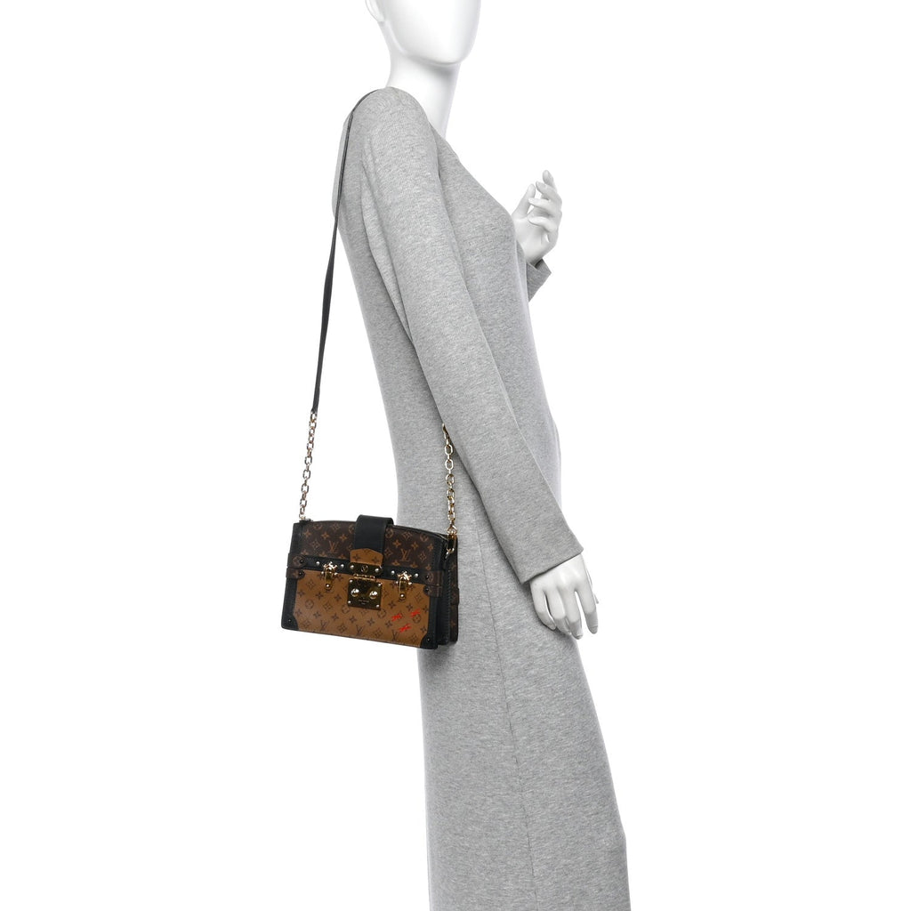 Reverse Monogram Trunk Clutch